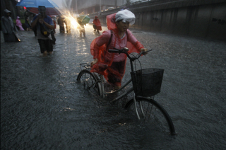 Illustration for article titled Beijing Flooding is Surreal and Awful